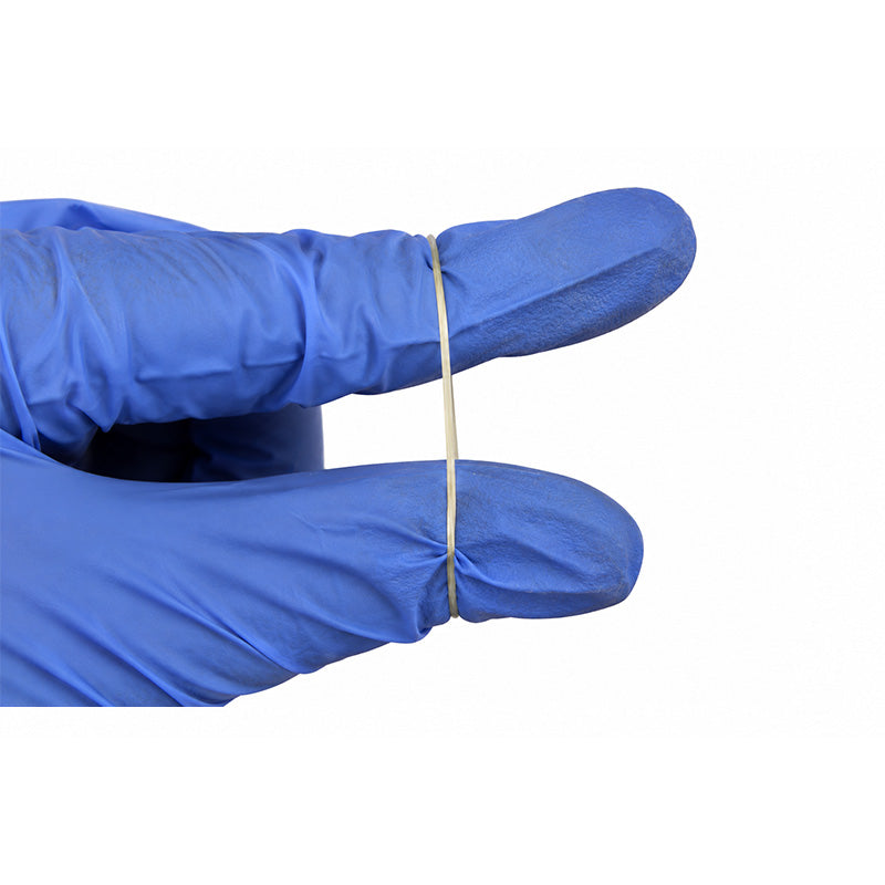TP Orthodontics plain latex elastics in tooth color, used for orthodontic treatment, shown in a close-up image.