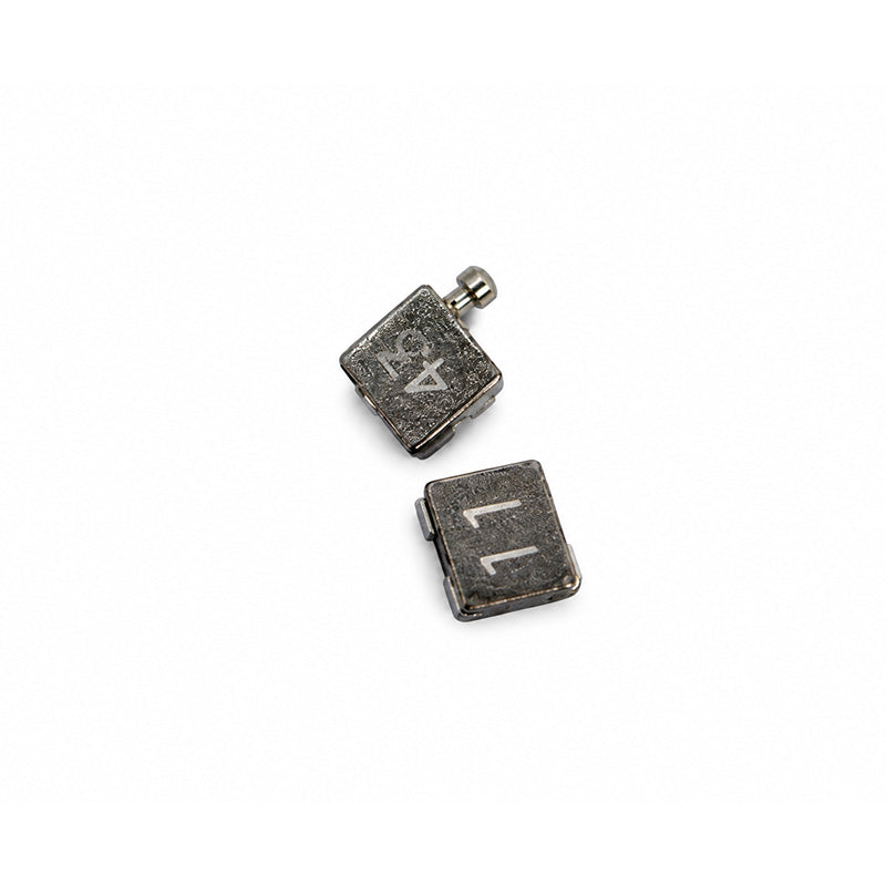 Metal orthodontic brackets from Dentaurum Orthodontics, Equilibrium Roth and MBT, in standard and mini sizes.