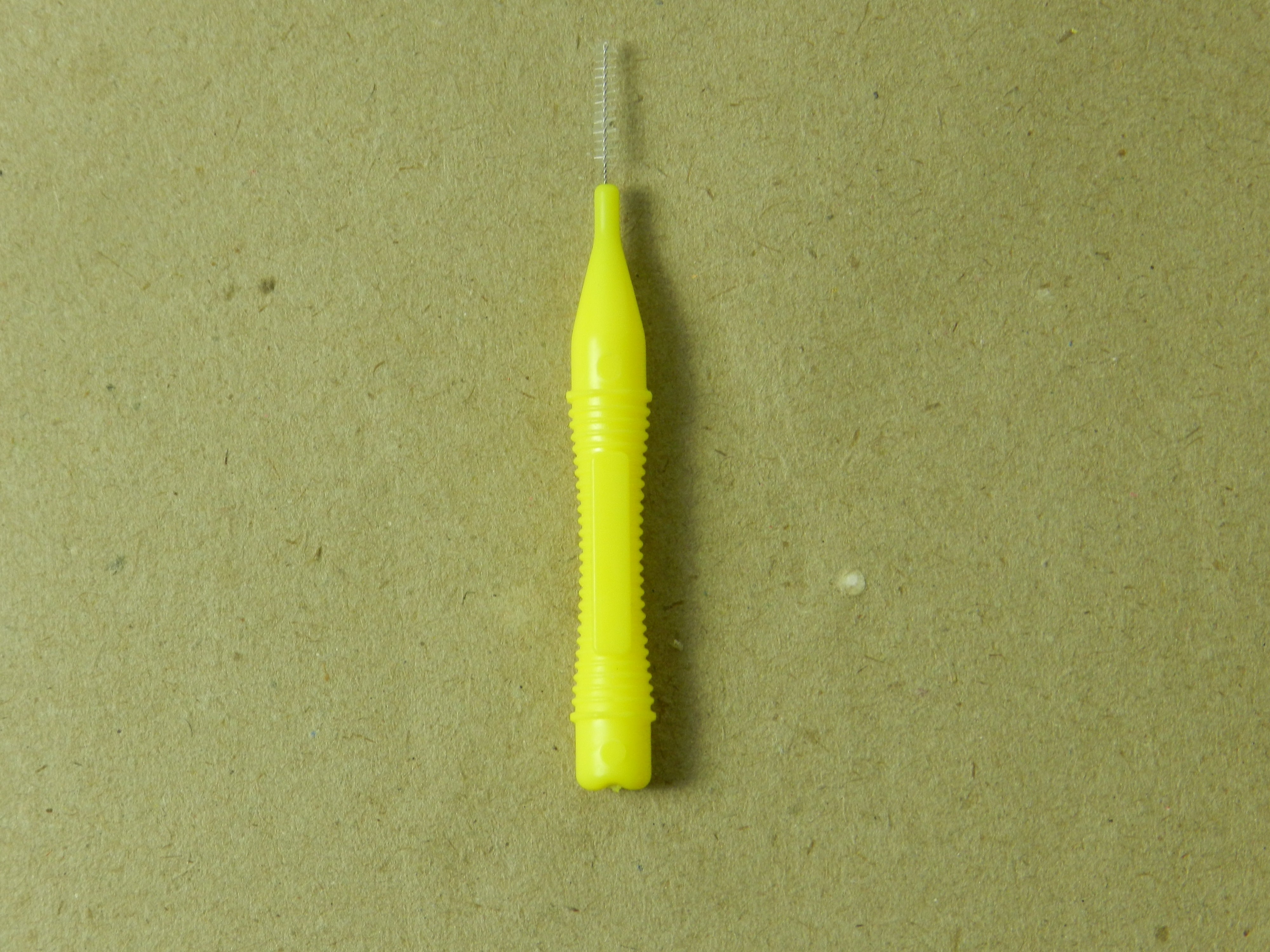 LD Ultra Interdental Brush from Dental Disposables, pack of 32, showing close-up of the small interdental brushes with blue handles.