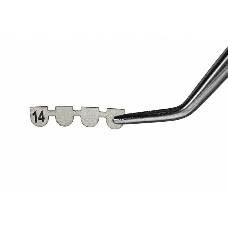 Leone Direct Bonding Lingual Retainer attached to lower teeth, showing clear wire and dental bonding material for orthodontic stability.
