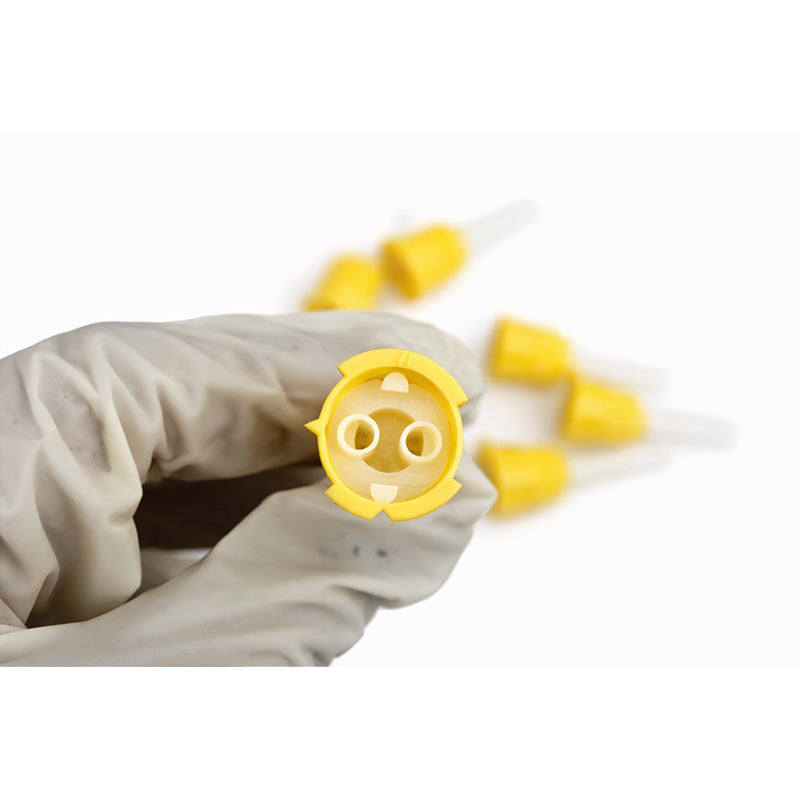 Yellow LD mixing tips for dental dispensing guns, 50-pack, designed for precise mixing of dental materials.