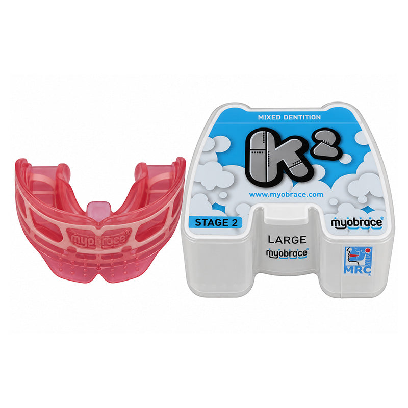 MRC Myobrace K2 for kids, orthodontic trainer appliance by Myofunctional Research Co., showing the mouthguard device in use.