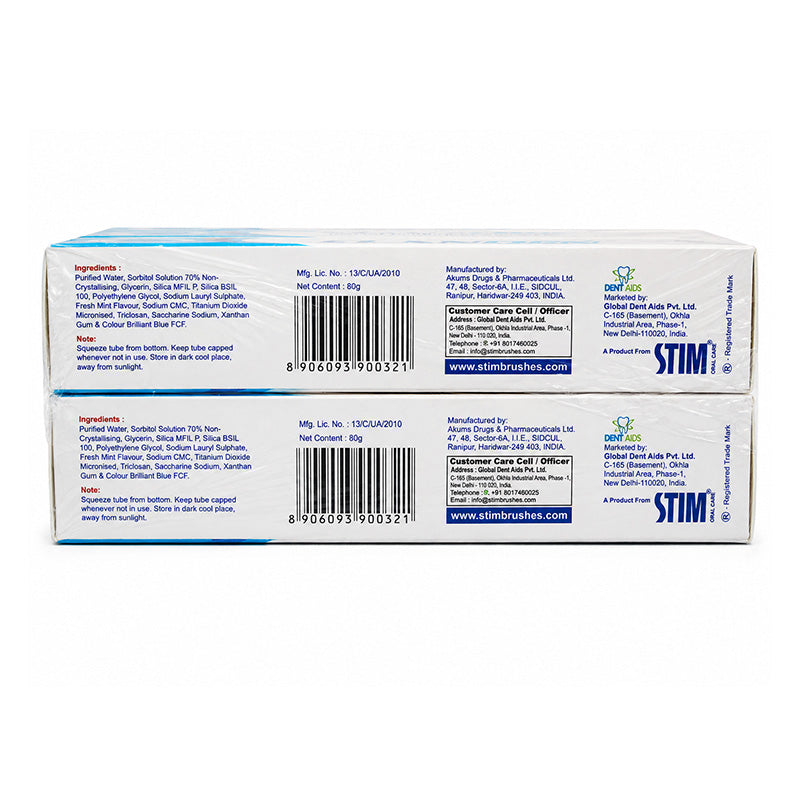 Close-up of STIM Claden Instant Denture Cleaning Paste tube, a denture adhesive product with a white and blue packaging design.