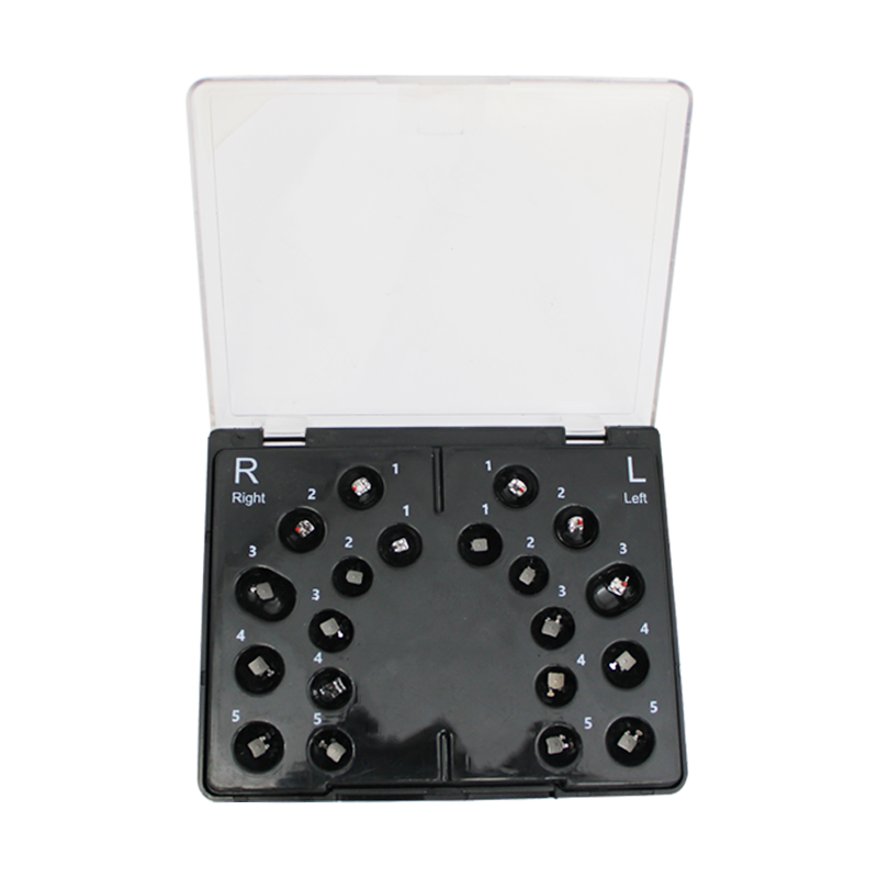 Aditek Vector+ MBT metal brackets kit with hooks for orthodontic treatment, featuring multiple brackets and hooks for dental braces.