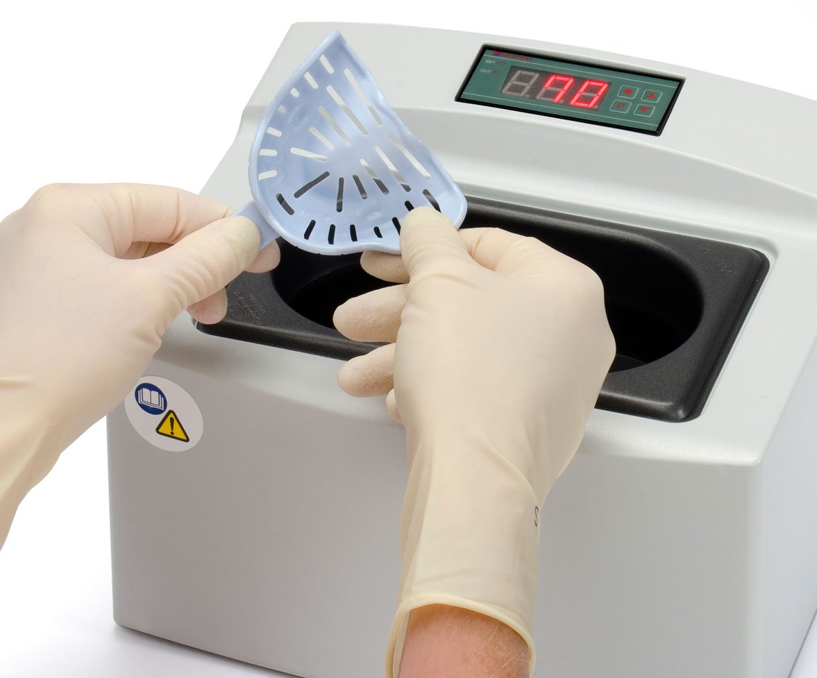 A set of large lower dentate Transform Heat Mouldable Impression Trays by Astek Innovations for dental impressions.