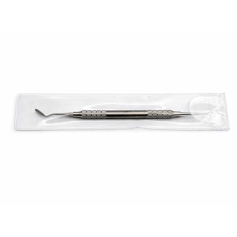 Atria Cord Packer Serrated CSI-1 tool with a textured handle and serrated tips for secure cord packing in dental procedures.