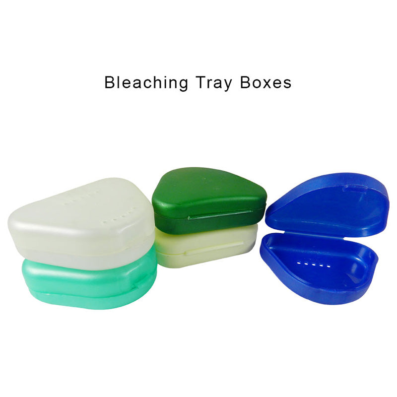 Capri denture and retainer bleaching tray boxes, white plastic storage containers for dental appliances.