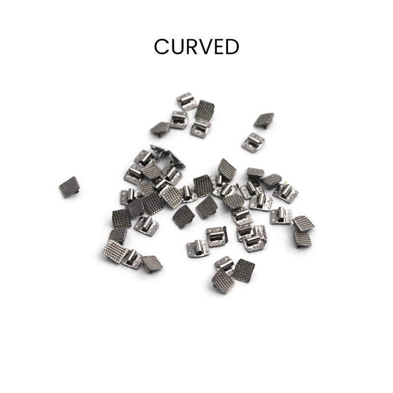 Set of 50 Captain Beggs Bondable Brackets for orthodontic appliances from Captain Orthodontics, curved design for easy bonding.