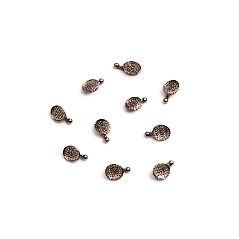 Captain Orthodontics bondable button with torquing hook, orthodontic dental appliance for secure attachment and precise tooth movement.