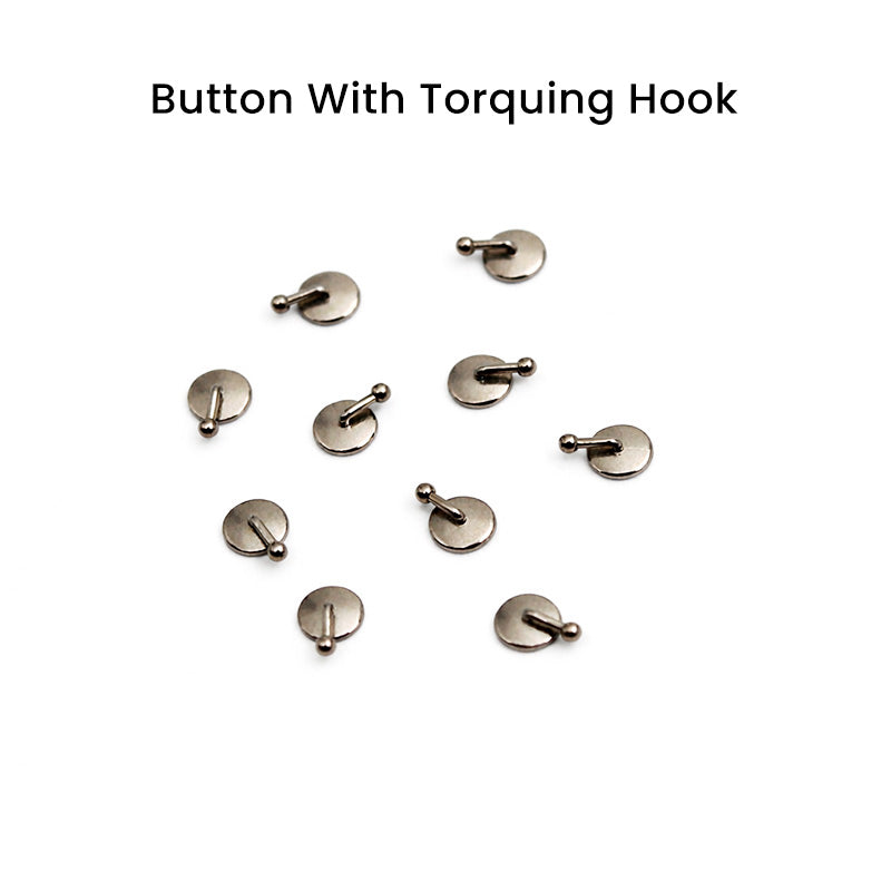 Captain Orthodontics bondable button with torquing hook, used in orthodontic treatment, shown attached to dental braces.
