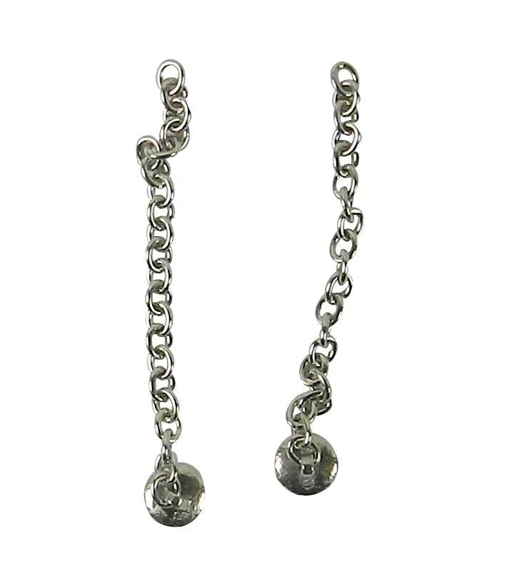 Captain Orthodontics lingual bondable buttons with chain for orthodontic treatment, shown attached to a dental arch in a close-up view.