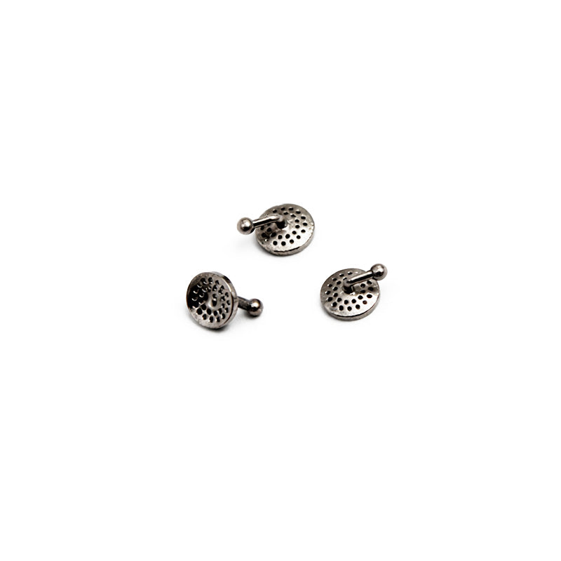 Captain Orthodontics bondable perforated button with hook, designed for orthodontic use, shown on a plain background.