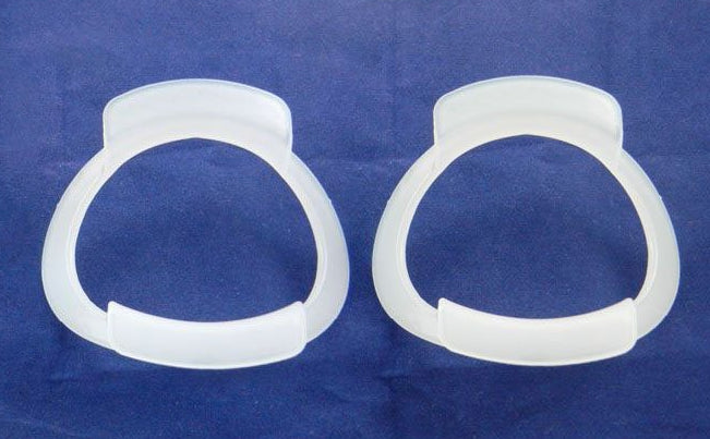 Captain Lip Retractor O Type for cheeks and tongue, orthodontic accessory by Captain Orthodontics, used for dental procedures.