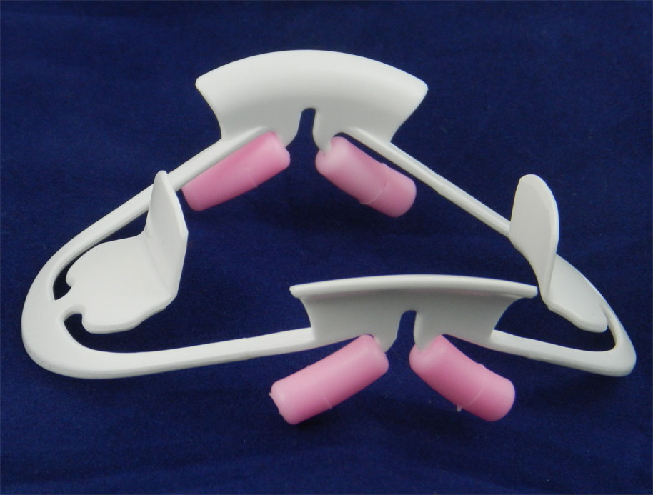 Captain Orthodontics Captain 3D Cheek and Tongue Retractor showing the clear, ergonomic retractor with handles for orthodontic procedures.