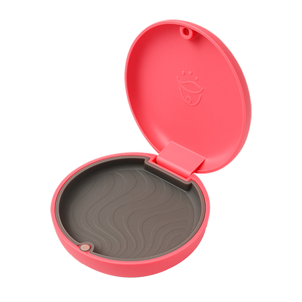Captain Orthodontics Captain Slim Aligner Case in hot pink with silicone layer, designed for denture and retainer storage.