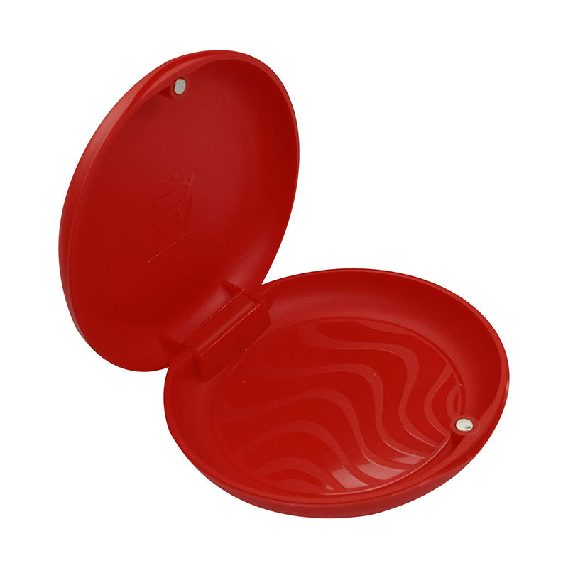 Red Captain Slim Aligner Case by Captain Orthodontics with silicone layer, designed for denture and retainer storage.