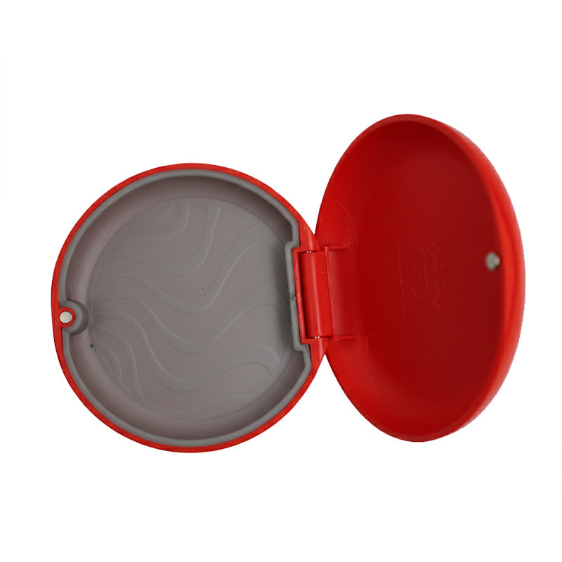 Red Captain Orthodontics Slim Aligner Case with silicone layer for denture and retainer storage in a compact design.