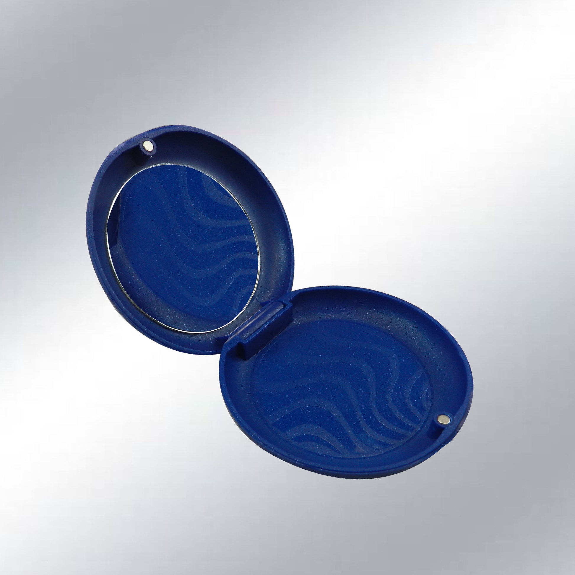 Captain Orthodontics Captain Slim Aligner Case in Sparkle Blue with silicone layer, a denture and retainer storage box.