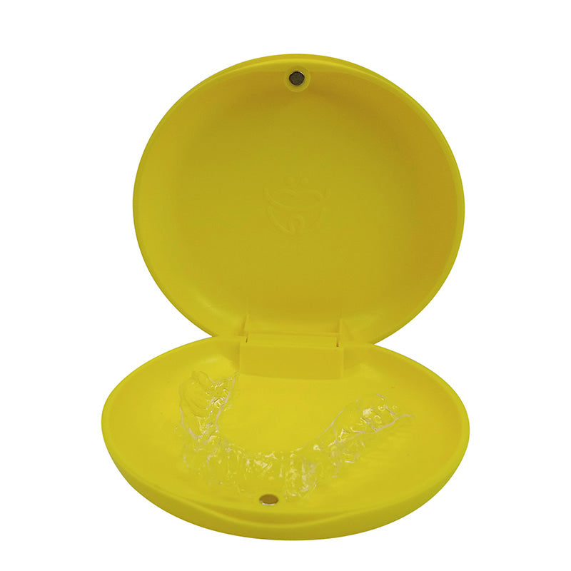 Captain Orthodontics Captain Slim Aligner Case in sunflower yellow with silicone layer, designed for denture and retainer storage.