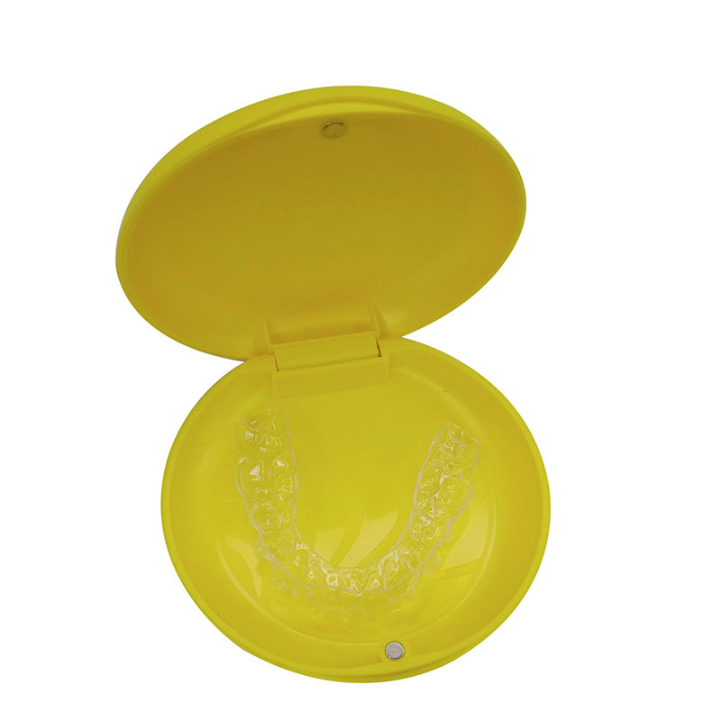 Captain Slim Aligner Case in sunflower yellow with silicone layer, designed for denture and retainer storage by Captain Orthodontics.