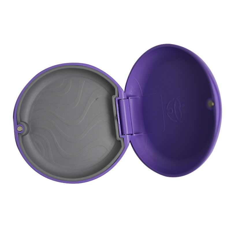 Captain Orthodontics violet Slim Aligner Case with silicone layer for denture and retainer storage, compact and protective.