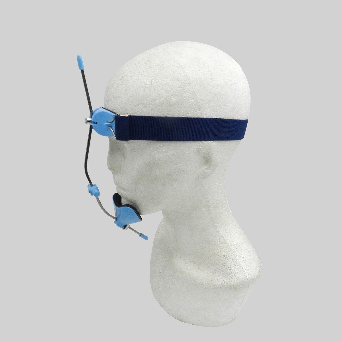 Sky blue Captain Orthodontics Petit Multi Adjustable Facemask with head strap and accessories, designed for comfortable orthodontic treatment.