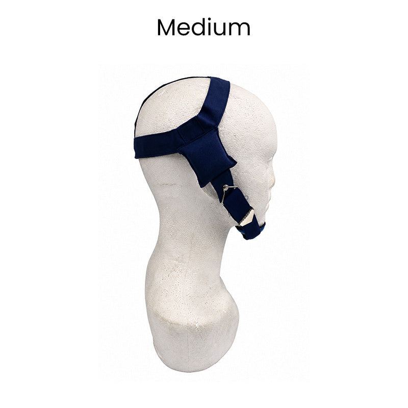 Navy blue Captain Orthodontics headgear with chin cap, adjustable headgear and accessories for orthodontic treatment.