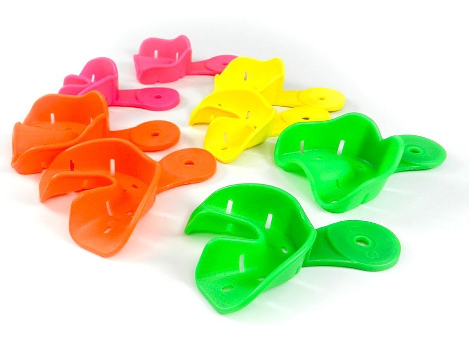 Set of four Captain Orthodontics Eco orthodontic autoclavable impression trays for dental impressions and orthodontic procedures.