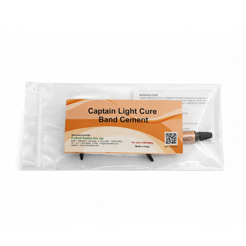 Captain Orthodontics Light Cure Band Cement syringe showing 5g of light-cure orthodontic cement in a professional dental setting.