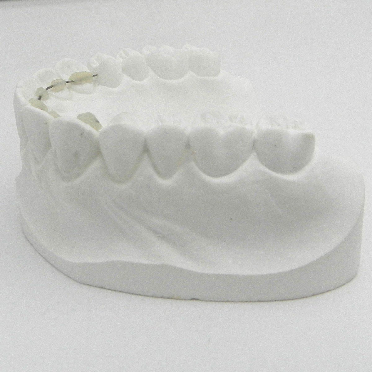 Captain Dead-Soft Lingual Retainer wire from Captain Orthodontics, showing a flexible, clear orthodontic lingual retainer wire on a white background.