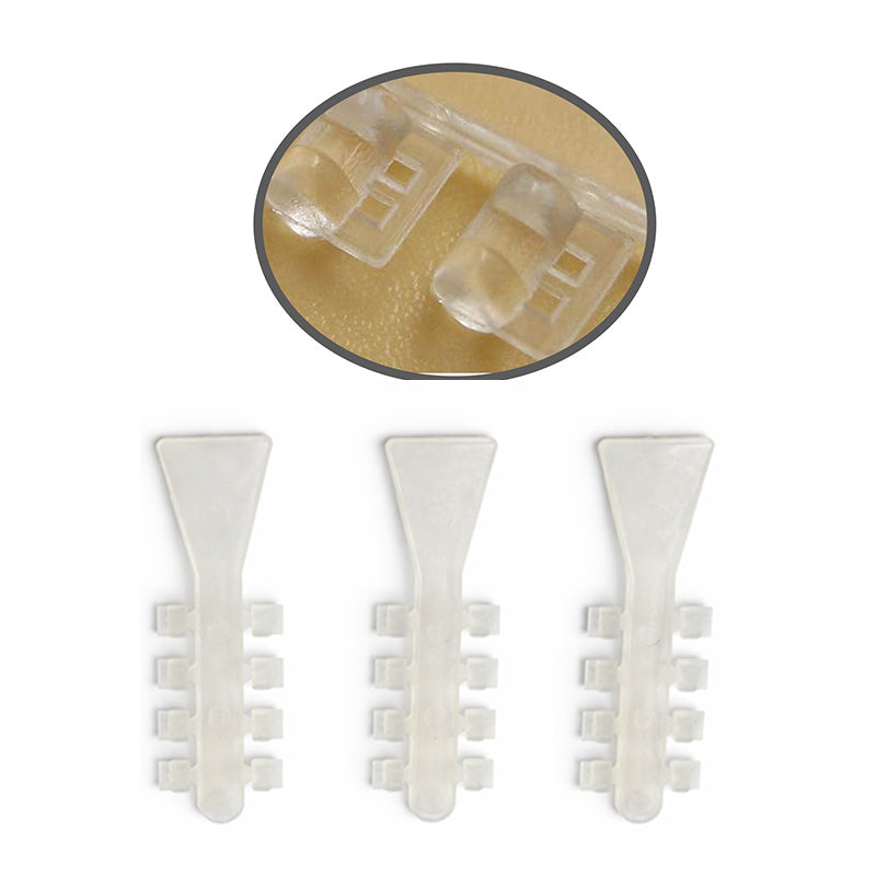 Clear Captain Rotation Wedges from Captain Orthodontics, showing their shape and size for orthodontic alignment.
