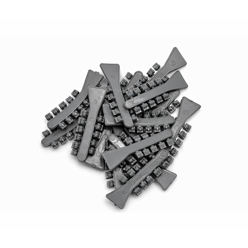Clear Captain Rotation Wedges by Captain Orthodontics, showing the small, transparent orthodontic appliances used for tooth rotation.