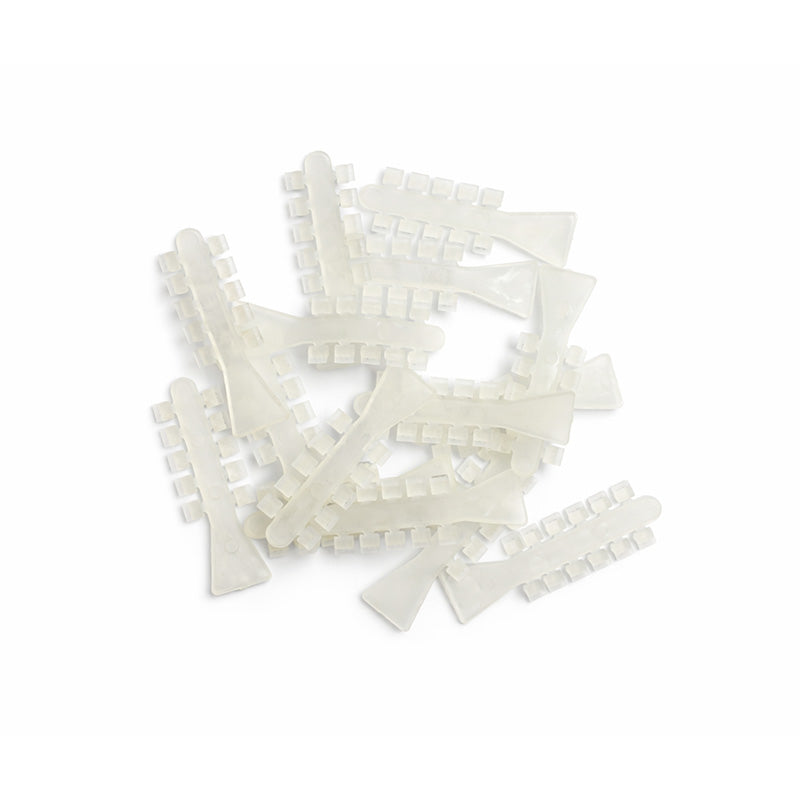 Clear Captain Rotation Wedges by Captain Orthodontics, showing their shape and design for orthodontic rotation correction.