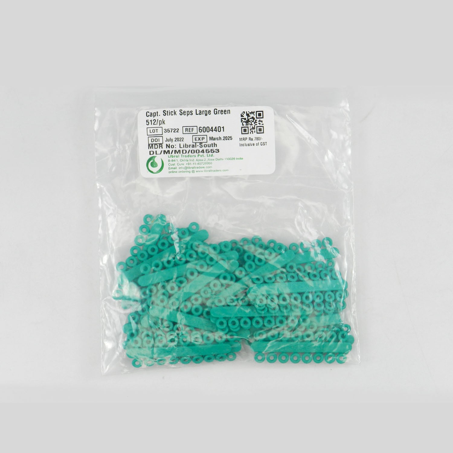 Large green Captain RO Sticks Separators used in orthodontic treatment by Captain Orthodontics, shown in close-up view.
