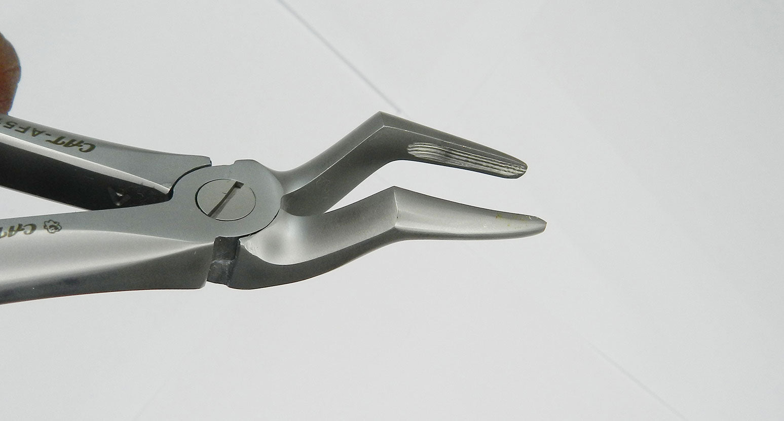 CAT Instruments adult extraction forceps with regular beak for upper and lower root tooth extractions in dental procedures.