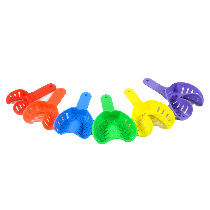 Pair of Centrino orthodontic autoclavable impression trays for dental impressions, durable and sterilizable for orthodontic use.