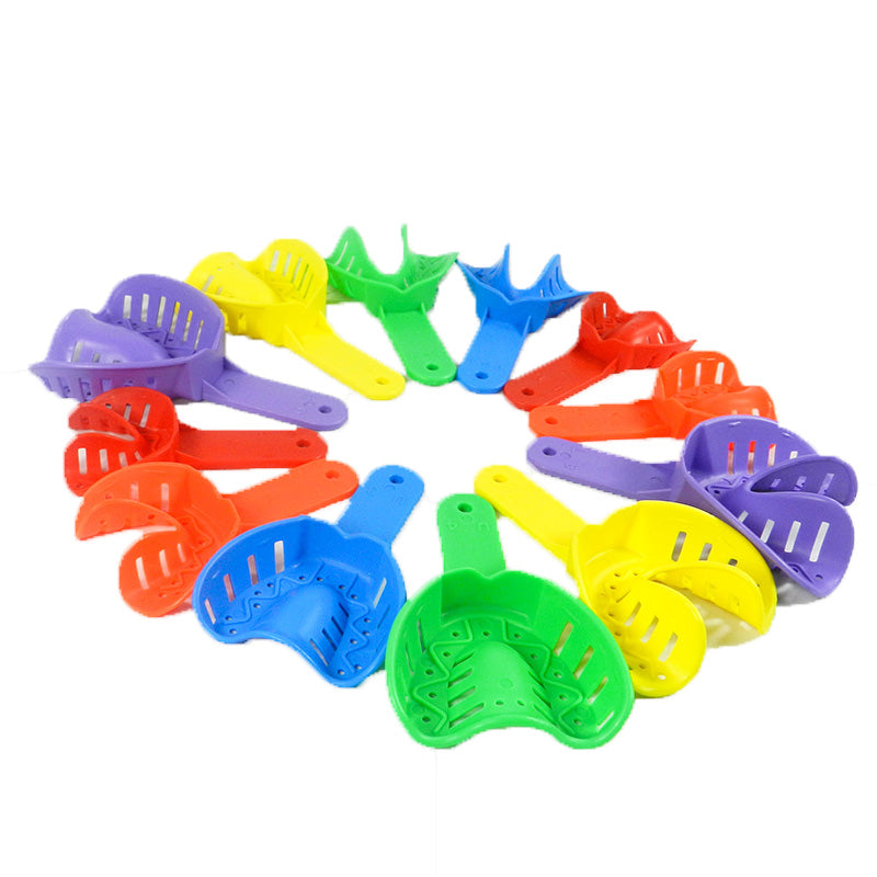 Pair of Centrino orthodontic autoclavable impression trays for accurate dental impressions in orthodontic procedures.