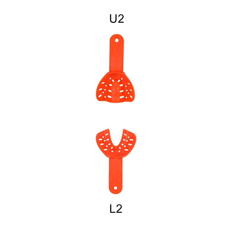 Pair of Centrino orthodontic autoclavable impression trays used for dental impressions in orthodontic procedures.