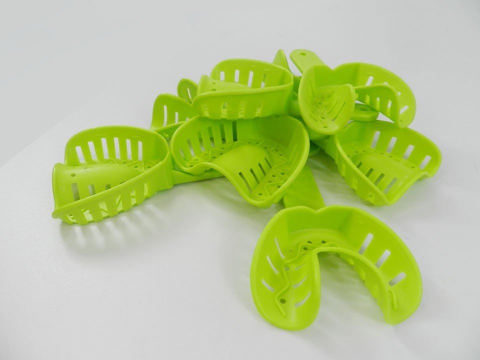 Centrino orthodontic autoclavable impression trays set with four pairs for upper and lower dental impressions, durable and sterilizable.