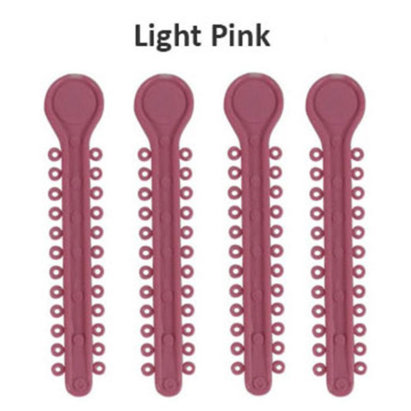 Centrino Ram Bagh low friction ligature stick ties in pearl color, used for dental braces and orthodontic appliances.