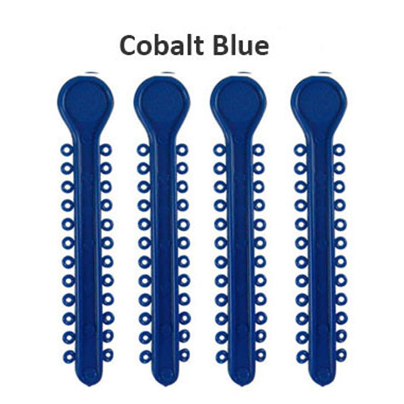 Centrino Ram Bagh low friction ligature stick ties in pearl, shown in a close-up image of the dental ligature ties.