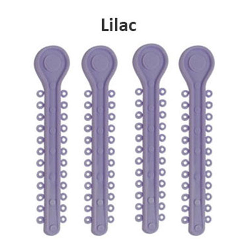 Centrino Ram Bagh low friction ligature stick ties in a pearl finish, arranged in a clear display showing their slim, lightweight design.