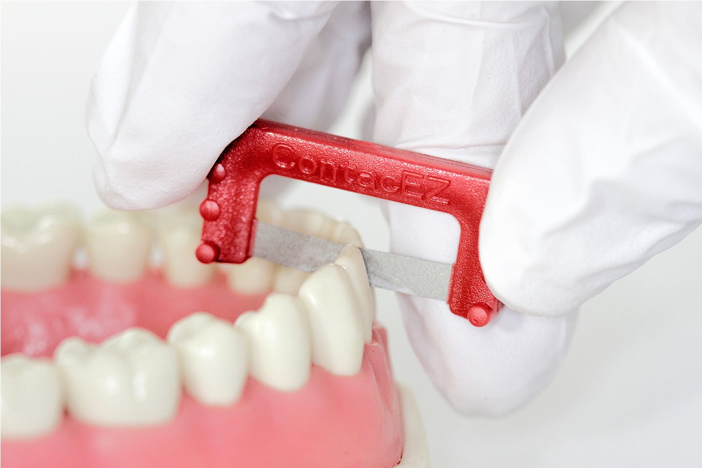 ContacEZ IPR Strip System kit showing multiple dental IPR tools and strips for orthodontic space management by ContacEZ.