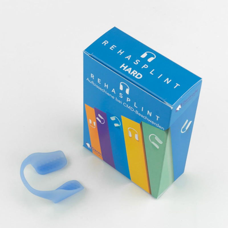 Dentrade Rehasplint dental trainer appliance in hard plastic, designed for dental splint therapy and jaw stabilization.