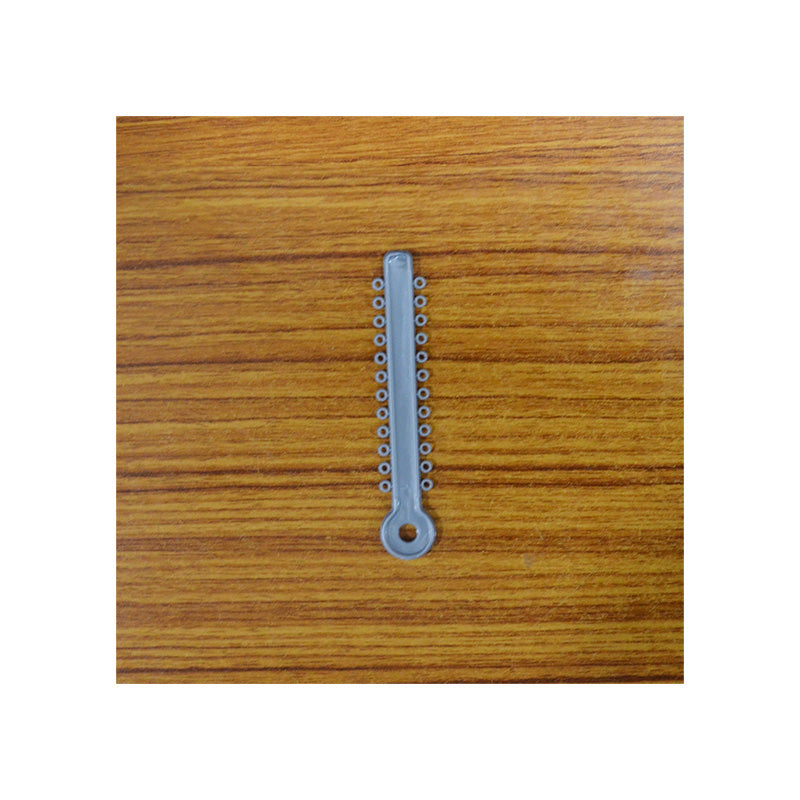 Silver Fox Ligature Ties for musical instruments, shown in a close-up image of the ties used to secure instrument components.