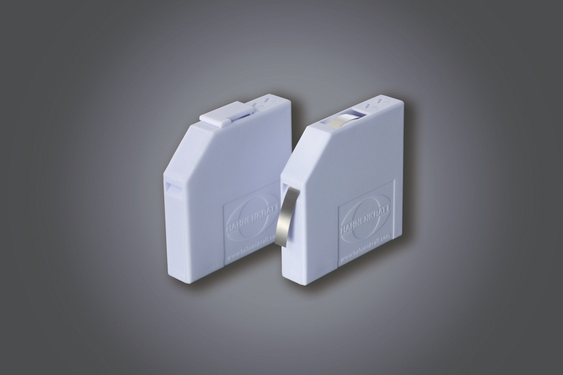 Hahnenkratt Matrix Bands Dental in Micro-Thin 3-M Roll Dispenser, showing thin, flexible dental matrix bands in a dispenser container.