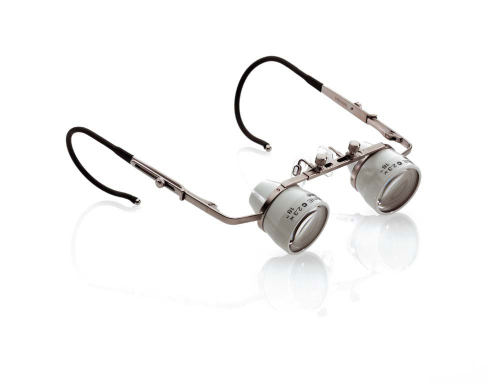 Heine binocular loupes with 2.3x magnification and 450mm frame for precise visual enhancement in medical or dental tasks.