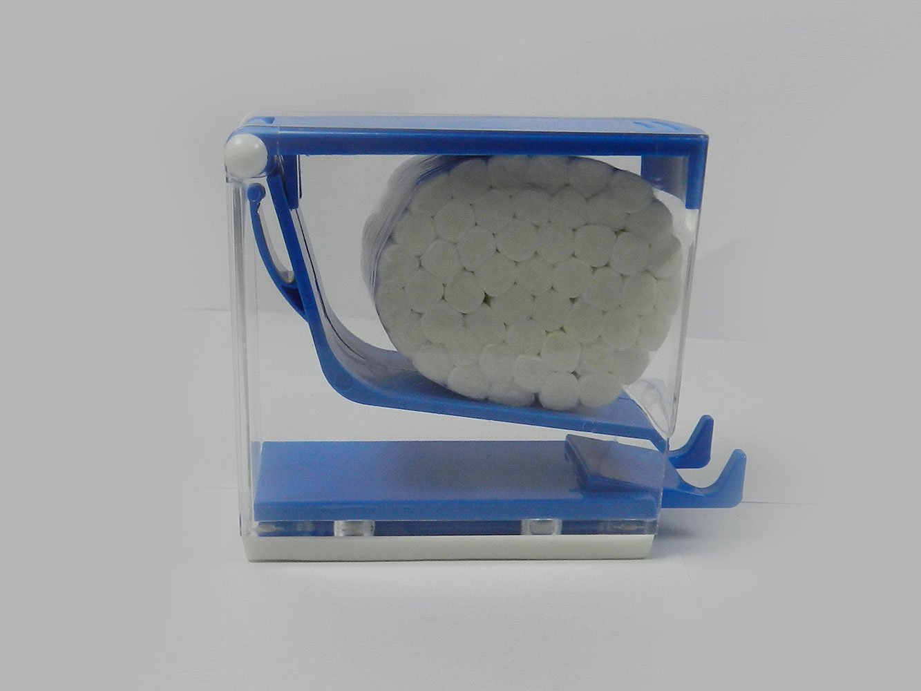 LD Cotton Roll Dispenser with one cotton roll, dental disposable dispenser for secure and easy cotton roll storage.