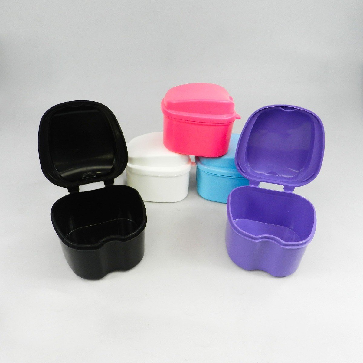 Assorted LD Denture & Retainer Boxes in a 10-pack, plastic storage cases for dentures and retainers, brand LD Dental Disposables.