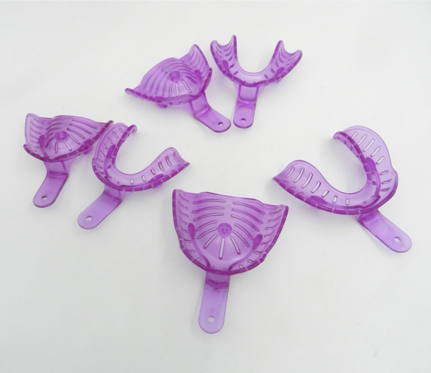 Pair of LD Nova Edentulous Impression Trays from LD Dental Disposables, used for dental impressions in prosthodontic procedures.